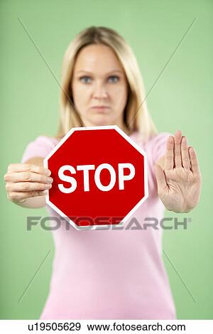 Woman Holding Road Traffic Sign View Large Photo Image Stock Photo - Woman Holding Road Traffic Sign. Fotosearch