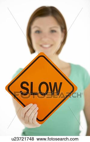 Woman Holding Road Traffic Sign View Large Photo Image Stock Photo - Woman Holding Road Traffic Sign. Fotosearch