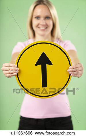 Woman Holding Road Traffic Sign View Large Photo Image Stock Photograph - Woman Holding Road Traffic Sign. Fotosearch