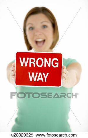 Woman Holding Road Traffic Sign View Large Photo Image Stock Photography - Woman Holding Road Traffic Sign. Fotosearch