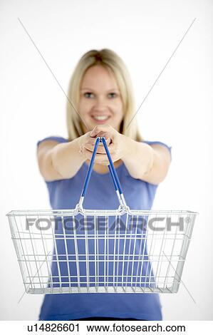 Woman Holding Shopping Basket View Large Photo Image Stock Image - Woman Holding Shopping Basket. Fotosearch
