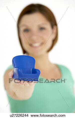 Woman Holding Small Armchair View Large Photo Image Picture - Woman Holding Small Armchair. Fotosearch