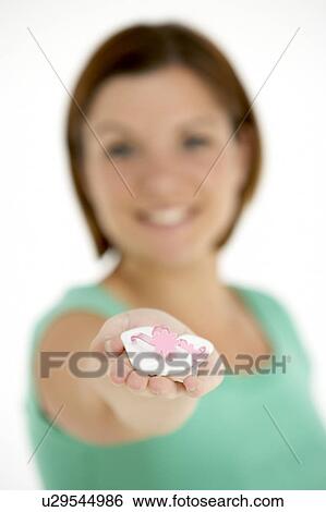 Woman Holding Small Beach Sandals View Large Photo Image Stock Photograph - Woman Holding Small Beach Sandals. Fotosearch