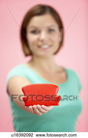 Woman Holding Small Sofa View Large Photo Image Stock Image - Woman Holding Small Sofa. Fotosearch