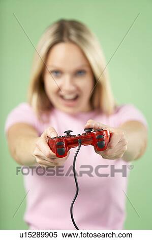 Woman Holding Video Game Controller View Large Photo Image Stock Photography - Woman Holding Video Game Controller. Fotosearch