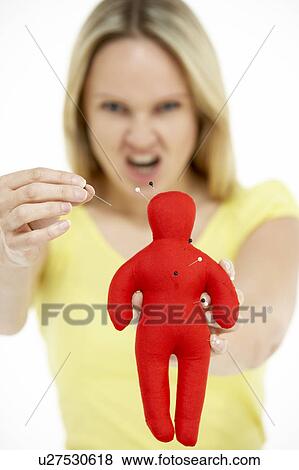 Woman Holding Voodoo Doll View Large Photo Image Stock Photo - Woman Holding Voodoo Doll. Fotosearch