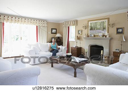 Woman Relaxing In Lounge View Large Photo Image Stock Photography - Woman Relaxing In Lounge. Fotosearch