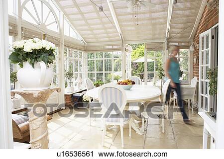 Woman Walking Through Conservatory View Large Photo Image Stock Image - Woman Walking Through Conservatory. Fotosearch