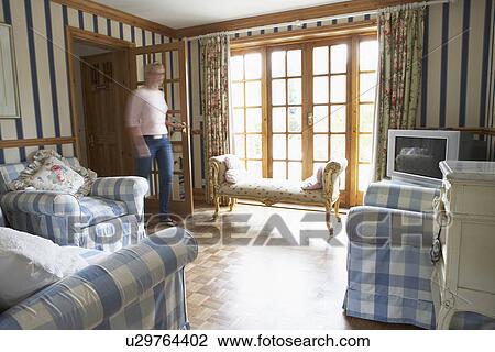Woman Walking Through Lounge View Large Photo Image Stock Image - Woman Walking Through Lounge. Fotosearch