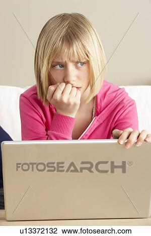 Worried Looking Girl Using Laptop View Large Photo Image Stock Image - Worried Looking Girl Using Laptop. Fotosearch