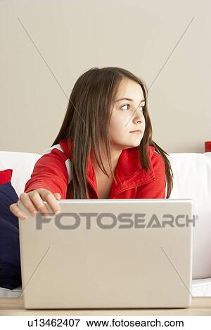 Worried Looking Girl Using Laptop View Large Photo Image Stock Photo - Worried Looking Girl Using Laptop. Fotosearch