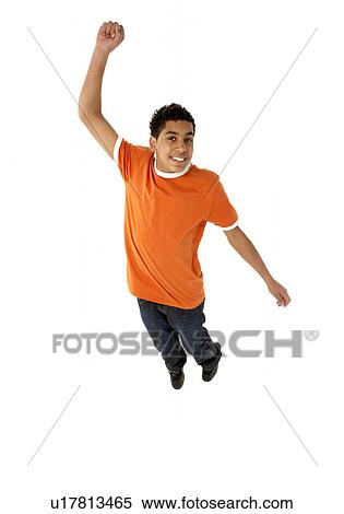Young Boy Leaping In Studio View Large Photo Image Stock Photography - Young Boy Leaping In Studio. Fotosearch
