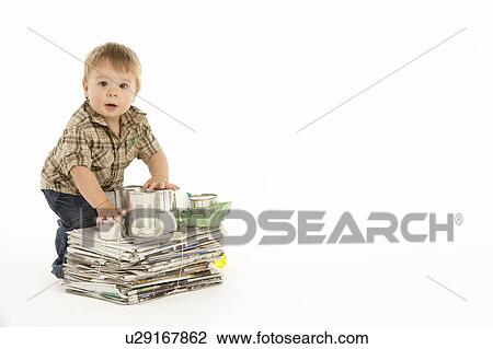 Young Boy Recycling In Studio View Large Photo Image Stock Image - Young Boy Recycling In Studio. Fotosearch