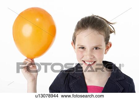 Young Girl Holding Party Balloon View Large Photo Image Picture - Young Girl Holding Party Balloon. Fotosearch