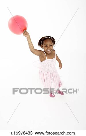 Young Girl Holding Party Balloon View Large Photo Image Stock Image - Young Girl Holding Party Balloon. Fotosearch
