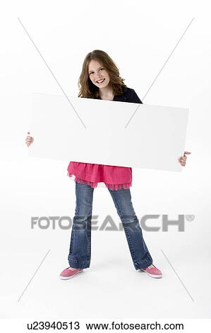 Stock Image - Young Girl Holding Party White Card. Fotosearch