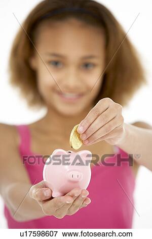Young Girl Holding Piggy Bank View Large Photo Image Stock Photo - Young Girl Holding Piggy Bank. Fotosearch