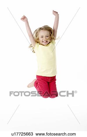 Stock Image - Young Girl Leaping In Air. Fotosearch