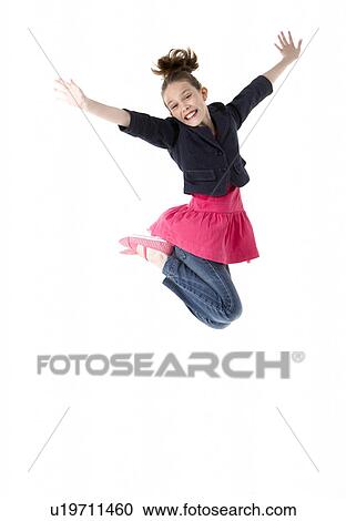 Stock Image - Young Girl Leaping In Air. Fotosearch