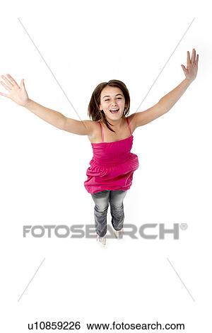 Stock Photograph - Young Girl Leaping In Studio. Fotosearch