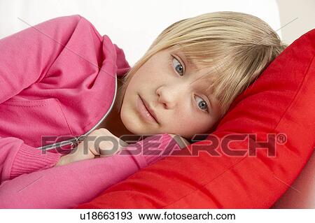 Young Girl Looking Sad On Sofa View Large Photo Image Stock Image - Young Girl Looking Sad On Sofa. Fotosearch