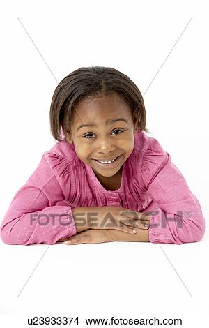 Young Girl Lying On Stomach In Studio View Large Photo Image Picture - Young Girl Lying On Stomach In Studio. Fotosearch