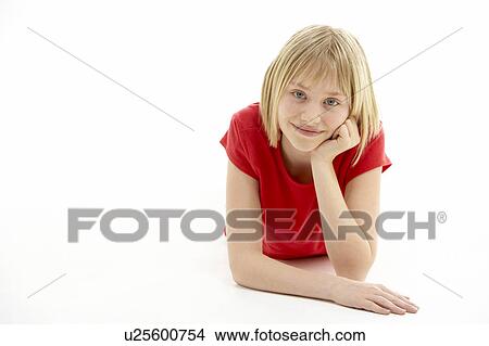 Young Girl Lying On Stomach In Studio View Large Photo Image Picture - Young Girl Lying On Stomach In Studio. Fotosearch