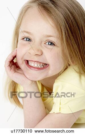Young Girl Lying On Stomach In Studio View Large Photo Image Stock Image - Young Girl Lying On Stomach In Studio. Fotosearch