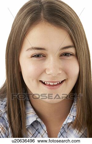 Stock Photograph - Young Girl Lying On Stomach In Studio. Fotosearch