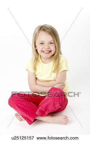Young Girl Sitting In Studio View Large Photo Image Stock Photo - Young Girl Sitting In Studio. Fotosearch