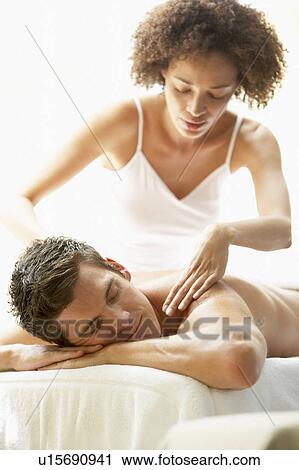Young Man Enjoying Massage At Spa View Large Photo Image Stock Image - Young Man Enjoying Massage At Spa. Fotosearch