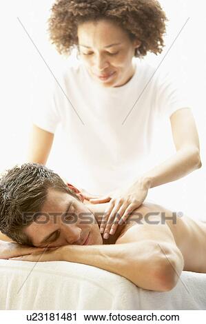 Young Man Enjoying Massage At Spa View Large Photo Image Stock Image - Young Man Enjoying Massage At Spa. Fotosearch