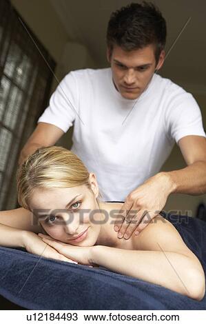 Young Woman Enjoying Massage View Large Photo Image Stock Image - Young Woman Enjoying Massage. Fotosearch