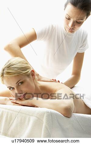 Young Woman Enjoying Massage View Large Photo Image Stock Photo - Young Woman Enjoying Massage. Fotosearch