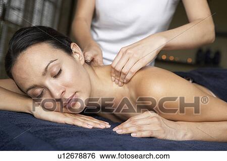 Young Woman Enjoying Massage View Large Photo Image Stock Photograph - Young Woman Enjoying Massage. Fotosearch