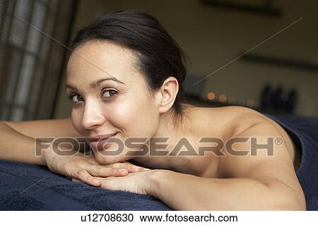 Young Woman Relaxing On Massage Table View Large Photo Image Stock Image - Young Woman Relaxing On Massage Table. Fotosearch