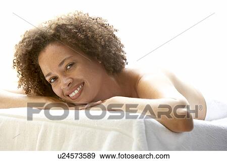 Young Woman Relaxing On Massage Table View Large Photo Image Stock Photo - Young Woman Relaxing On Massage Table. Fotosearch