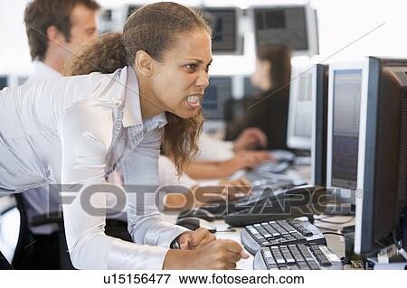 Angry Stock Trader Looking At Screen View Large Photo Image Stock Photo - Angry Stock Trader Looking At Screen. Fotosearch