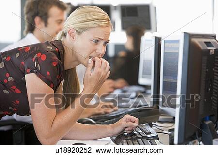 Anxious Woman Looking At Computer Monitor View Large Photo Image Stock Image - Anxious Woman Looking At Computer Monitor. Fotosearch