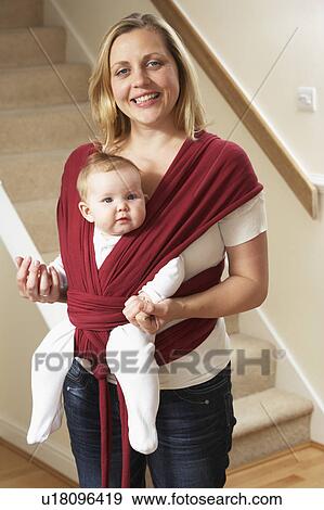 Baby In Sling With Mother View Large Photo Image Stock Photo - Baby In Sling With Mother. Fotosearch