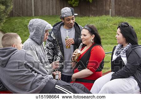 Gang Of Youths Sitting On Cars View Large Photo Image Picture - Gang Of Youths Sitting On Cars. Fotosearch