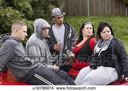 Gang Of Youths Sitting On Cars View Large Photo Image Picture - Gang Of Youths Sitting On Cars. Fotosearch