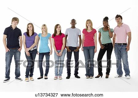 Stock Photo - Group Of Teenage Friends In Studio. Fotosearch