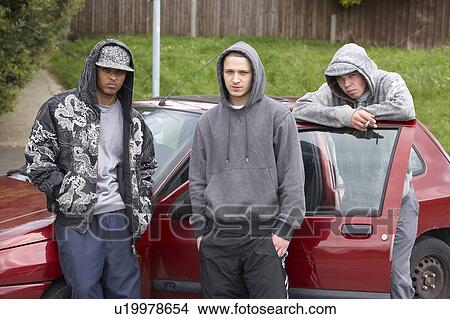 Group Of Young Men With Cars View Large Photo Image Picture - Group Of Young Men With Cars. Fotosearch