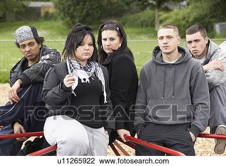 Stock Image - Group Of Young People In Playground. Fotosearch