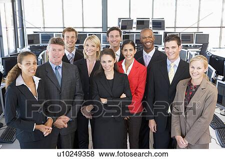 Stock Photo - Group Shot Of Stock Traders. Fotosearch