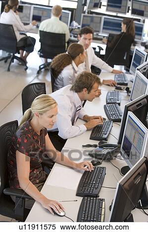 Stock Photography - High Angle View Of Stock Traders At Work. Fotosearch