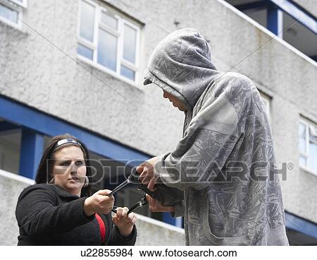 Man Mugging Woman In Street View Large Photo Image Picture - Man Mugging Woman In Street. Fotosearch