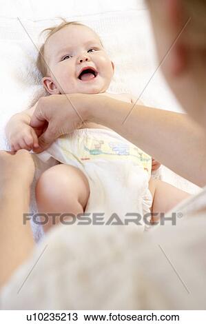 Mother Changing Baby Nappy View Large Photo Image Stock Image - Mother Changing Baby Nappy. Fotosearch