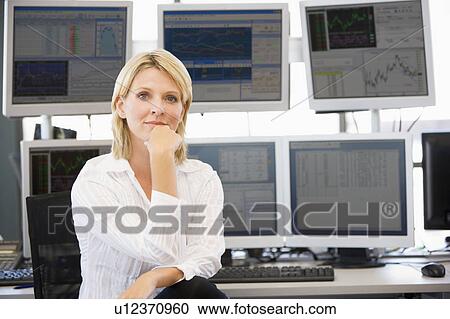 Portrait Of Stock Trader In Front Of Computer Monitors View Large Photo Image Stock Image - Portrait Of Stock Trader In Front Of Computer Monitors. Fotosearch